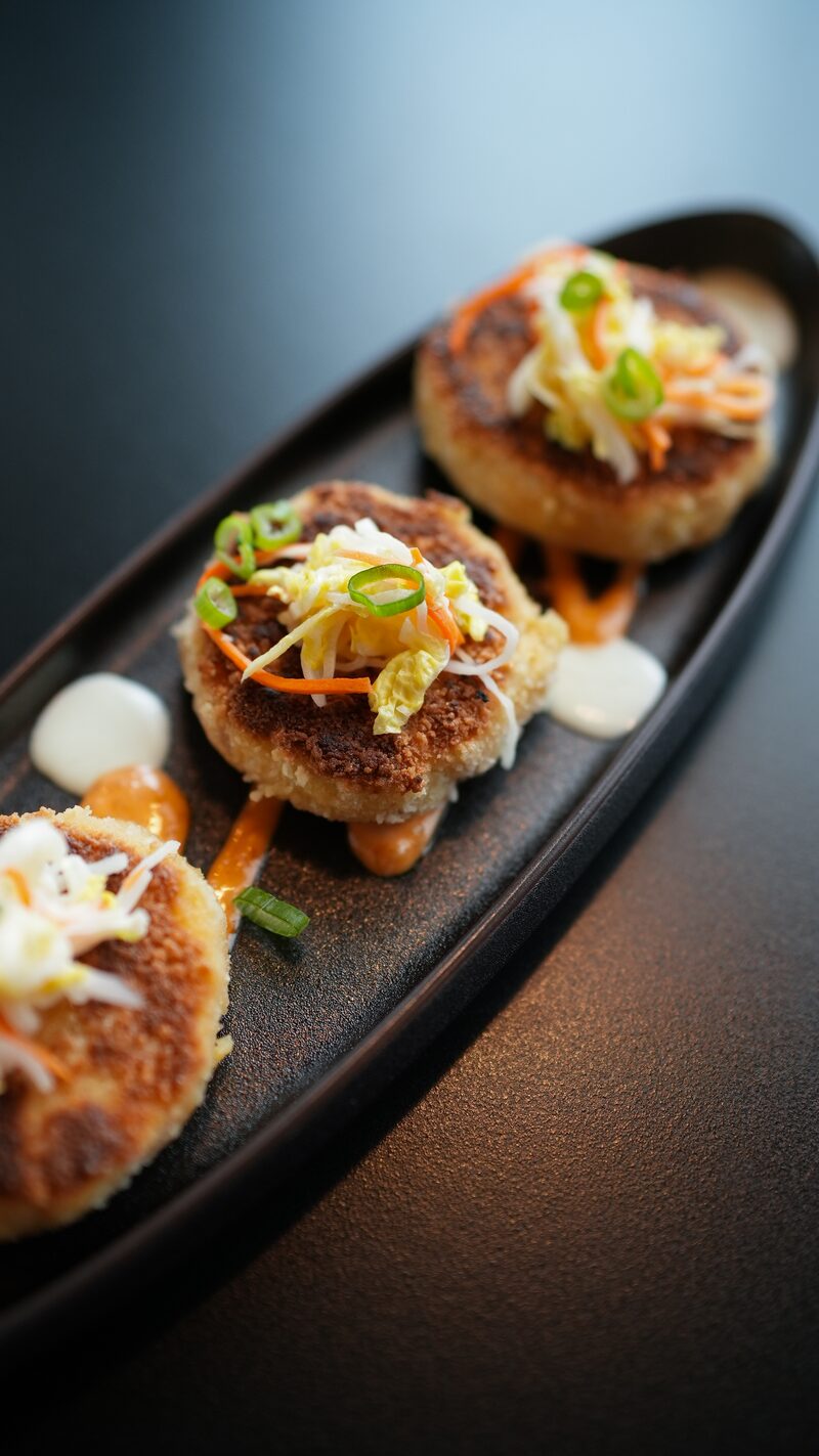 Jumbo lump crab cakes with daikon slaw