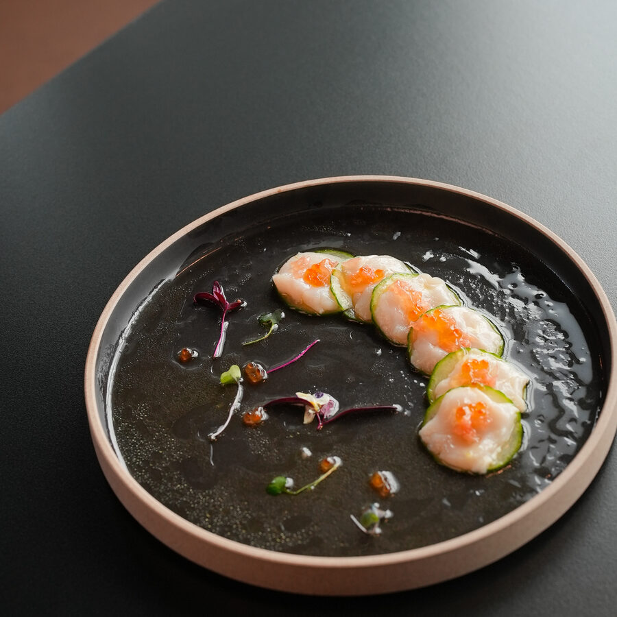 Seafood donburi in a dark bowl